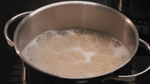 Boiling Pasta Cooking in Pot with Bubbling Water Stock Footage 327317425
