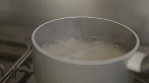 Boiling pasta, panning, slow motion Stock Footage 56766140