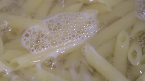 Boiling pasta,Macro Stock Footage 107824169