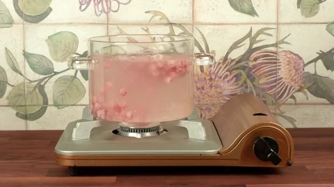 Boiling pink tapioca pearls or boba in a glass pot to make boba for bubble tea 스톡 동영상 271035747