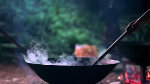 Boiling Plant Materials to Extract Natural Fabric Dye Stock Footage 336823271