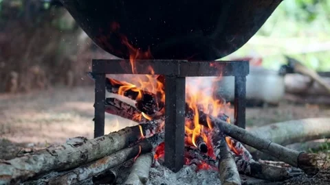 Boiling Plant Materials to Extract Natural Fabric Dye Stock Footage 336823282