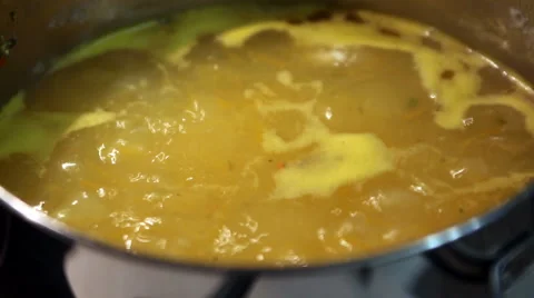 Boiling in a pot of pumpkin soup Stock Footage 67011440
