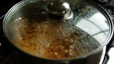 Boiling Pot Removing Lid.mp4 스톡 동영상 10702400