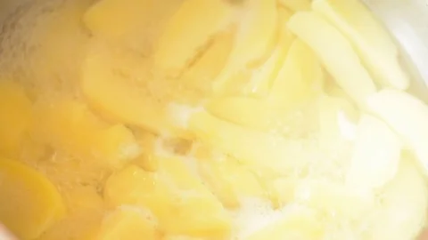 Boiling potatoes and vegetable soup, close up. Stock Footage 73141103