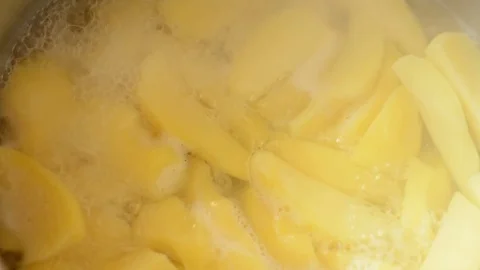 Boiling potatoes Stock Footage 73140502