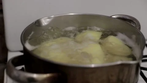 Boiling potatoes Stock Footage 146077398