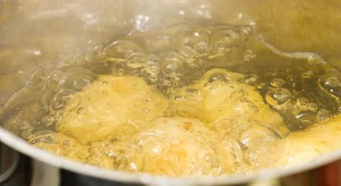 Boiling potatoes Stock Photos