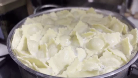 Boiling Ravioli in Steamy Pot 動画素材 345338687
