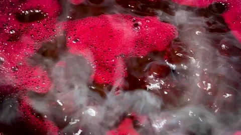 Boiling Red Purple Dye Liquid With Steam in Traditional Fabric Dyeing Stock-Footage 336721817
