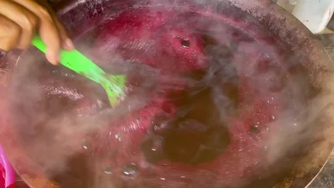 Boiling Red Purple Dye Liquid With Steam in Traditional Fabric Dyeing Stock-Footage 336721818