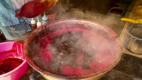 Boiling Red Purple Dye Liquid With Steam in Traditional Fabric Dyeing Stock-Footage 336721828