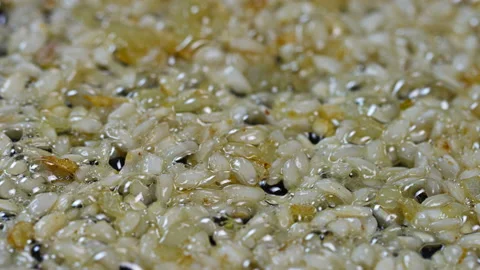 Boiling Risotto In Frying Pan Stock Footage 145631830