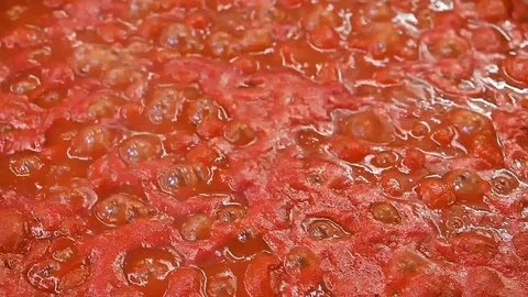Boiling sauce Cherry tomatoes,Macro Food vegetarian background Stock Footage 116045758