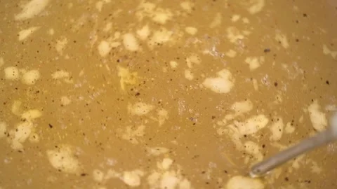 Boiling, savory rich beef broth with spices and gelatin. closeup. Stock Footage 320212136