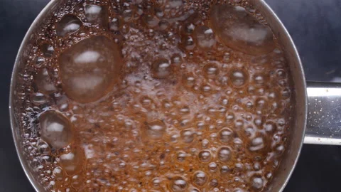 Boiling сoffee. Close up. Stock Footage 95562719