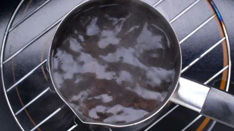 Boiling сoffee. Close up. Stock Footage 95999039