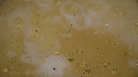 Boiling soup, closeup of bubbles. Stock Footage 41030930