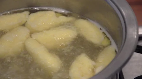 Boiling soup with dumplings Stock Footage 43280542