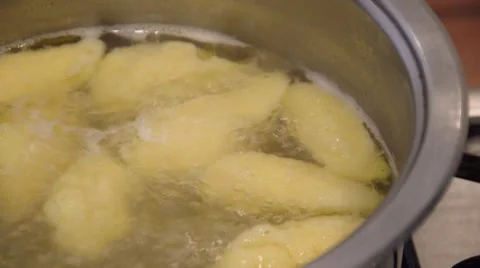 Boiling soup with dumplings Stock Footage 43280603