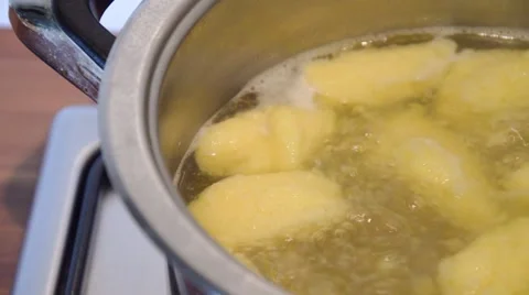 Boiling soup with dumplings Stock Footage 43281682