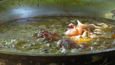 Boiling soup,meat and vegetables in pot,preparing goulash,traditional way. Stock Footage 81560550
