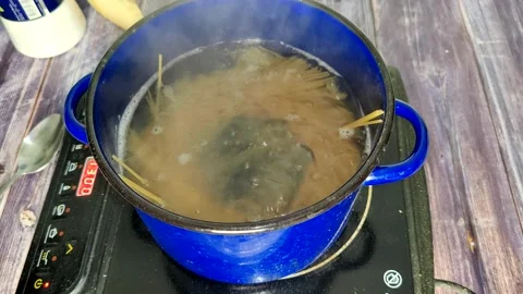 Boiling spaghetti Stock Footage 227721616
