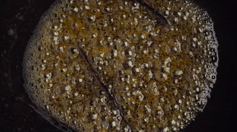 Boiling sugar syrup with vanilla pods Stock Footage 56338953