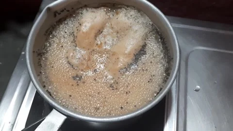 Boiling tea on gas Stock Footage 145340488