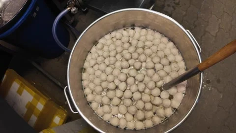 Boiling Thai Fish Balls in Pot Street Food Cooking Process Close-Up, 4K Stock Footage 331984189