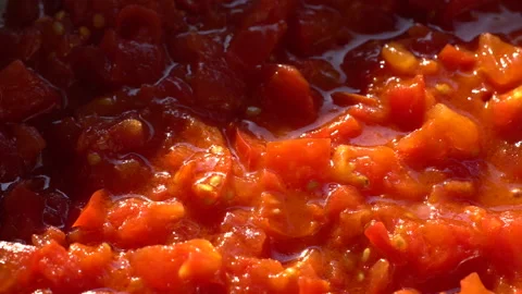 Boiling tomato sauce.  Pan Right. Close up. Stock Footage 136044372