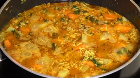 Boiling vegetable and meat Stock Footage 106648303