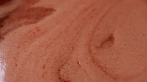 Boiling viburnum jam with pulp in a close-up. Side view. Stock Footage 165992986