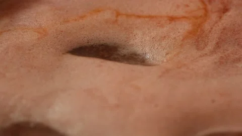 Boiling viburnum jam with pulp in a close-up. Side view. Stock Footage 165993280