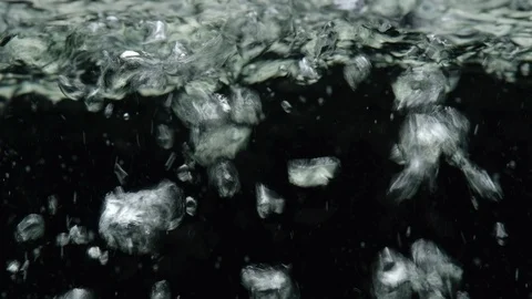 Boiling water with air bubbles close up Stock Footage 121438931