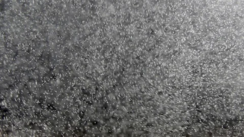 Boiling water. Air bubbles float in a liquid. Black-white texture. Video stock 119984809