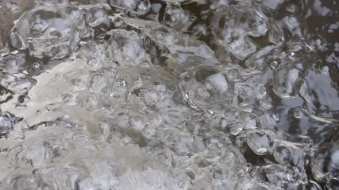 Boiling water with bubbles background. Close up slow motion shot of hot boiling 스톡 동영상 154710630