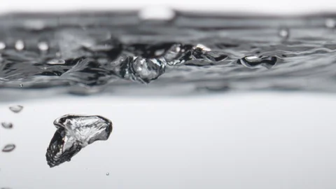 Boiling water bubbles, slow motion Stock Footage