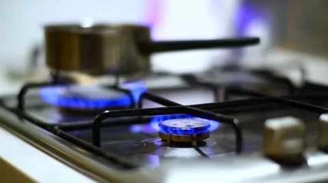 Boiling water in the can on natural blue gas, kitchen Stock Footage 34034558