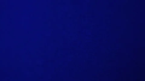 A boiling water close up in blue light Stock Footage 124955973