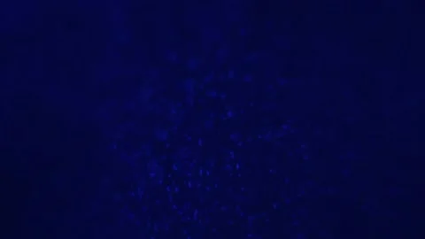 A boiling water close up in blue light Stock Footage 124956034