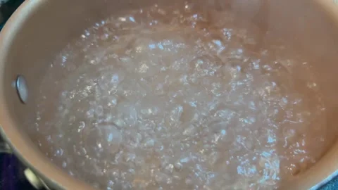 Boiling Water Close Up in Cooking Pot Stock Footage 344593717