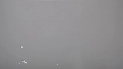 Boiling water close-up, slow-motion, view from the side. Stock Footage 124303885