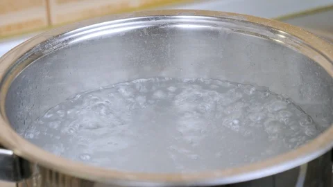 Boiling water in cooking pot Stock Footage 87301541