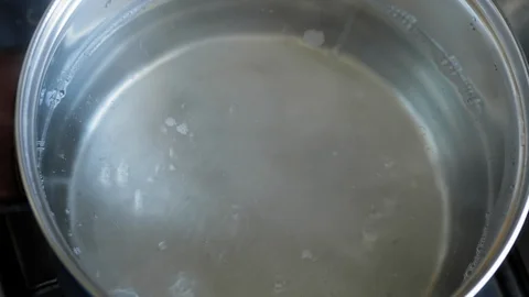 Boiling Water Cooking Pot  in the kitchen Stock-Footage 129036885
