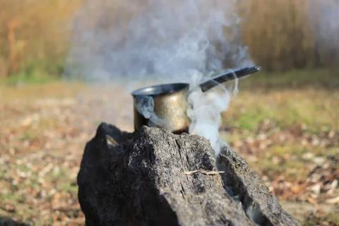 Boiling water on the fire Stockfoto's