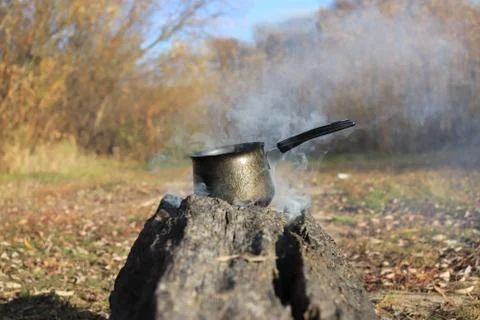 Boiling water on the fire Stock Photos