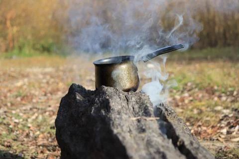 Boiling water on the fire Stock Photos