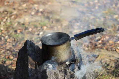 Boiling water on the fire Stock Photos
