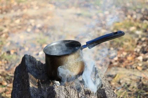 Boiling water on the fire Stockfoto's